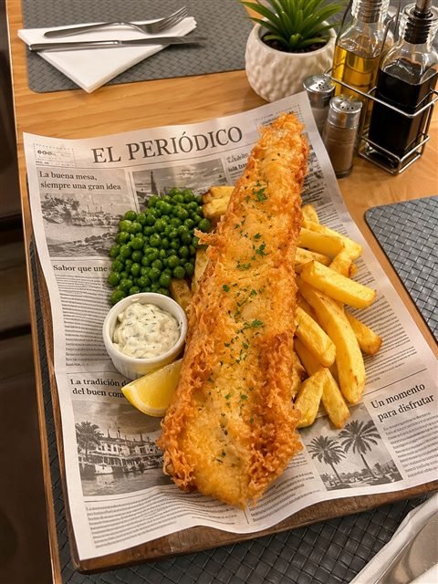 Battered fish, chips and peas